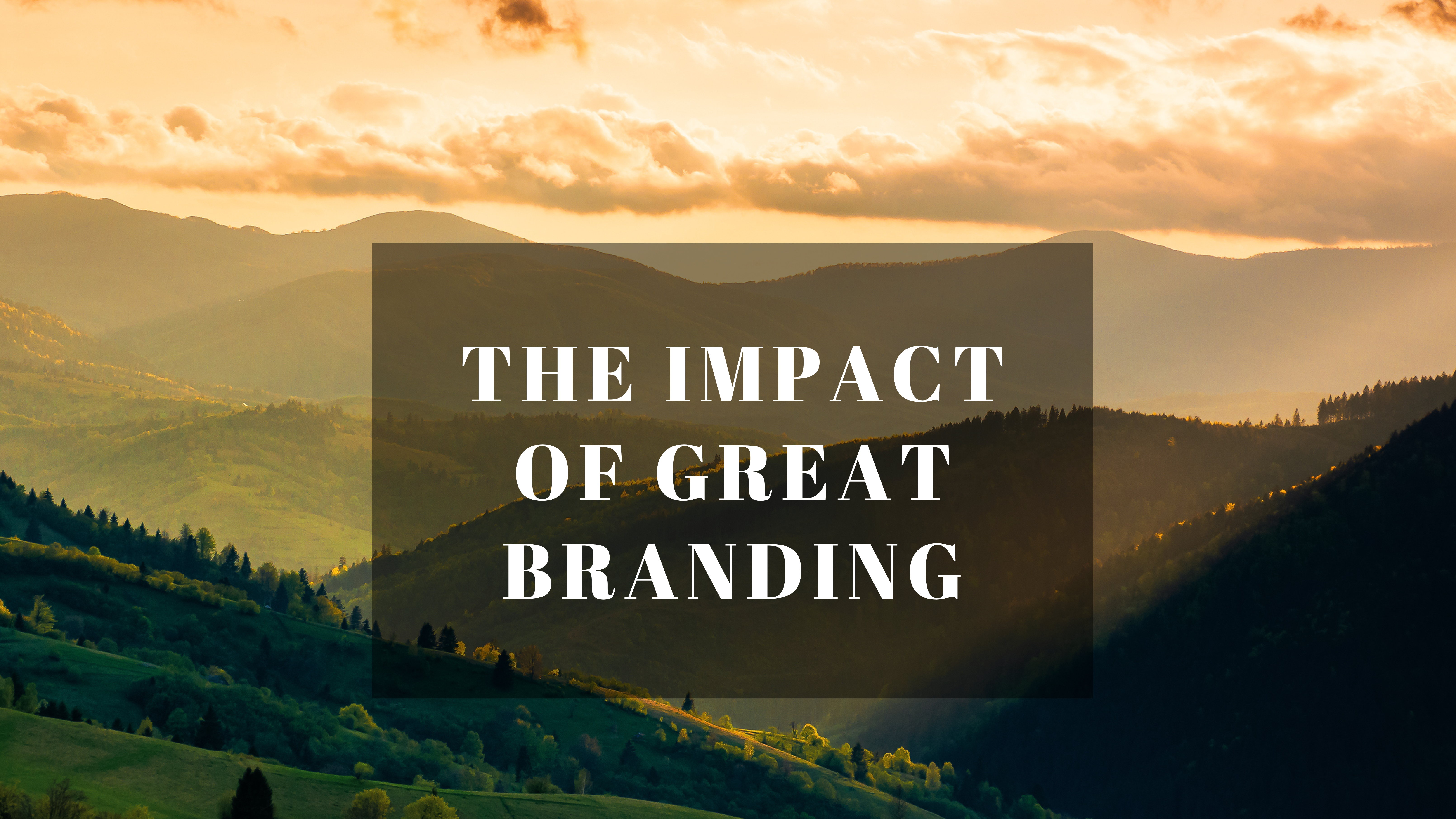 A mountain range with a sunset behind it. In the center of the image are the words "The impact of great branding"